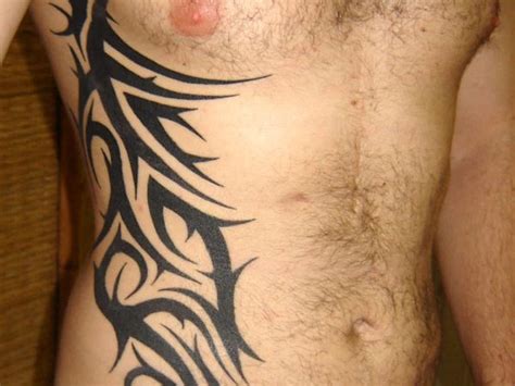 19 Beautiful Tribal Side Tattoos 19 Beautiful Tribal Side Tattoos