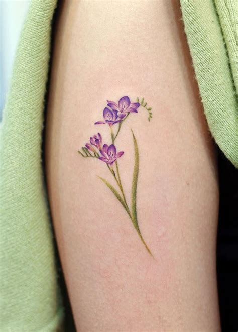20 Beautiful Freesia Flower Tattoo Ideas