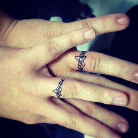 40 Sweet Amp Meaningful Wedding Ring Tattoos Styletic
