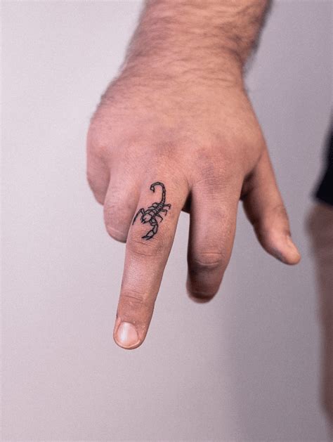 46 Super Cool Finger Tattoo Designs To Get You Inspired