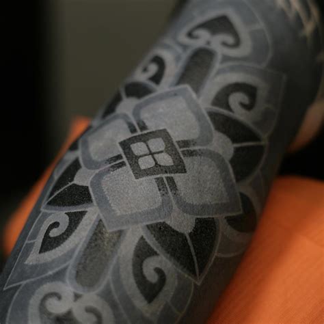 50 Beautiful Blackout Tattoos With White Ink For Perfect Contrast