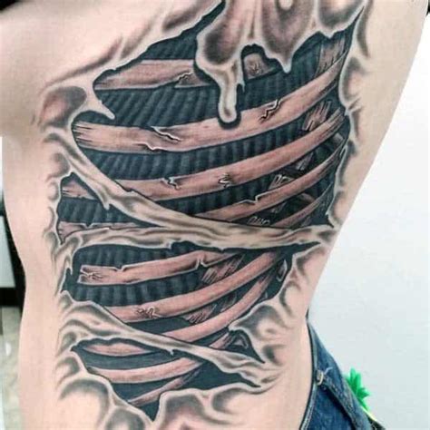 50 Ripped Skin Tattoo Designs For Men Manly Torn Flesh Ink