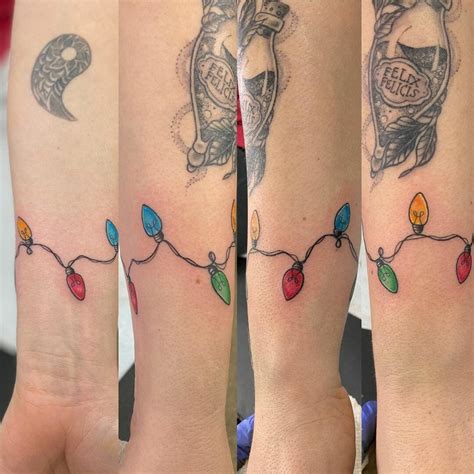57 Lovely And Glorious Festive Christmas Lights Tattoos Ideas And