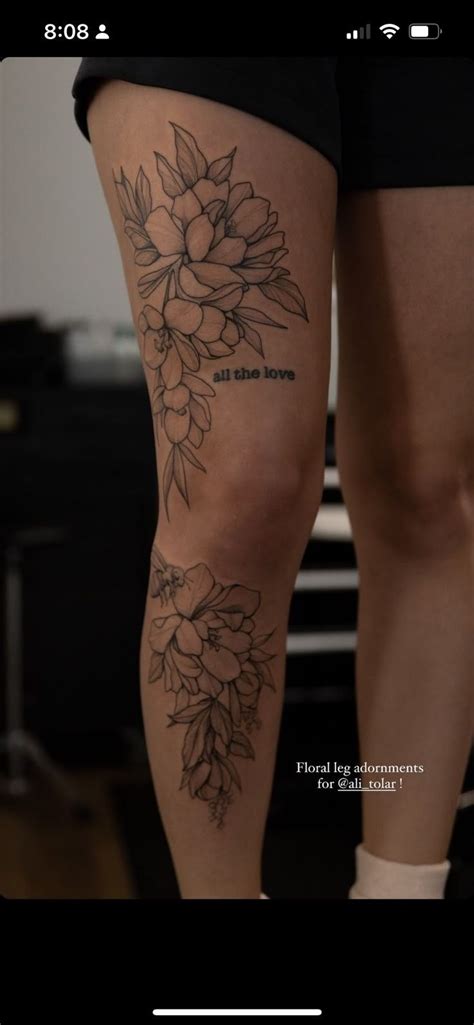 A Woman Amp 39 S Thigh With Flowers On It