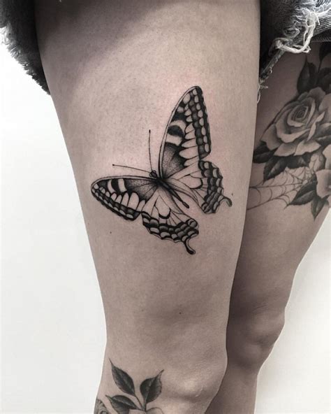 Black Ink Butterfly On Girls Thigh
