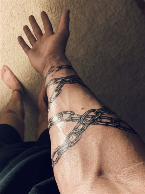 Chain In 2025 Chain Tattoo Around Arm Tattoo Black Ink Tattoos