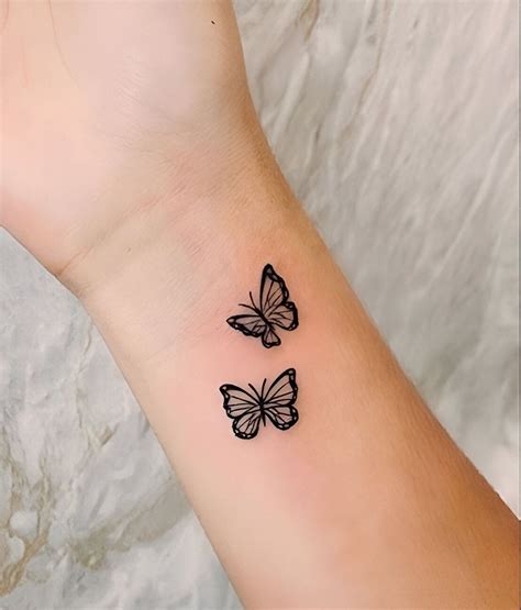 Charming Butterfly Tattoos On Wrist Wrist Tattoos Girls Hand Tattoos