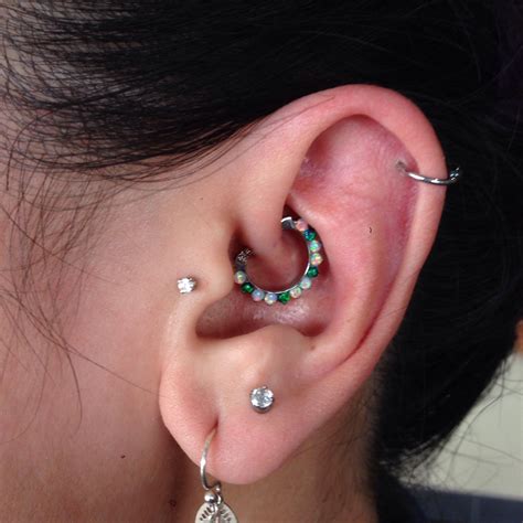 Daith With Industrial Strength Clicker Done At Club Tattoo San