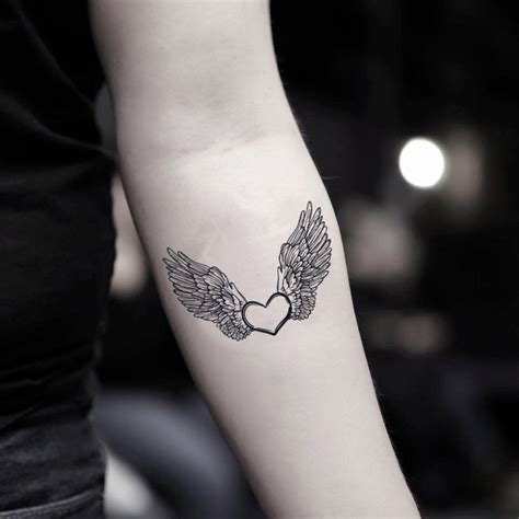 Heart With Angel Wings Temporary Tattoo Sticker Ohmytat Heart With Angel Wings Temporary Tattoo Sticker Ohmytat