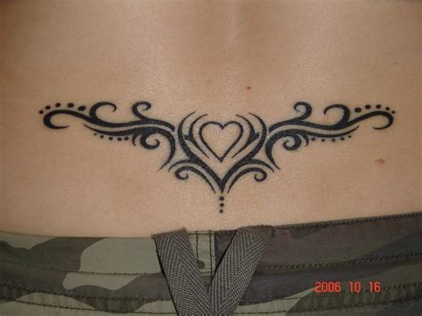 Infinity Tattoo Girl Lower Back Tribal Tattoo Infinity Tattoo Girl Lower Back Tribal Tattoo