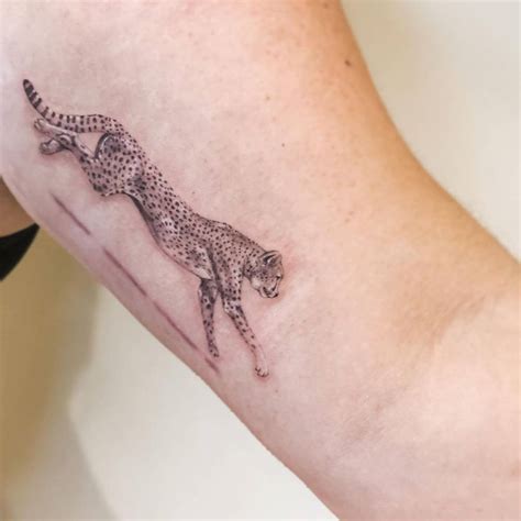 Micro Realistic Cheetah Tattoo On The Inner Arm Micro Realistic Cheetah Tattoo On The Inner Arm