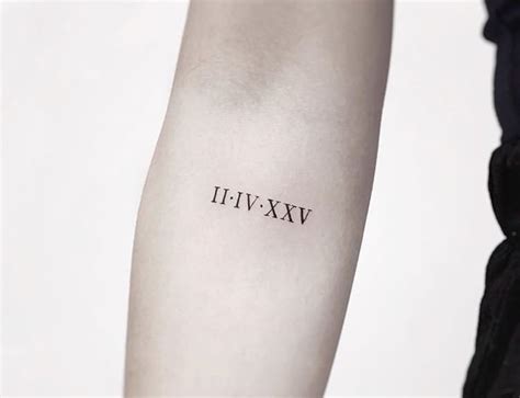 Minimalist Roman Numeral Clock Tattoo