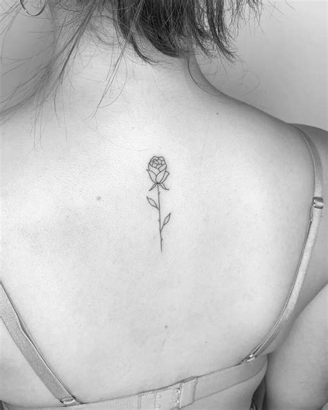 Minimalist Rose Tattoo On The Upper Back Minimalist Rose Tattoo On The Upper Back