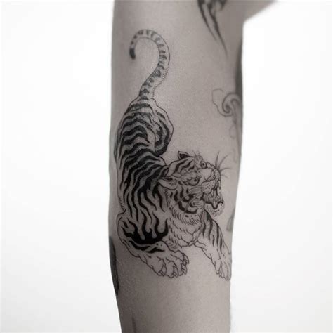 Neo Japanese Style Tiger Tattoo Located On The Forearm Neo Japanese Style Tiger Tattoo Located On The Forearm