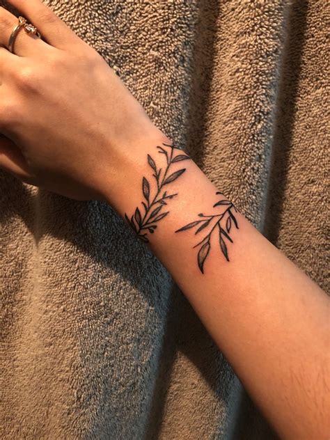 Olive Branches Tattoo Arms Wrap Around Wrist Tattoos Around Arm Olive Branches Tattoo Arms Wrap Around Wrist Tattoos Around Arm
