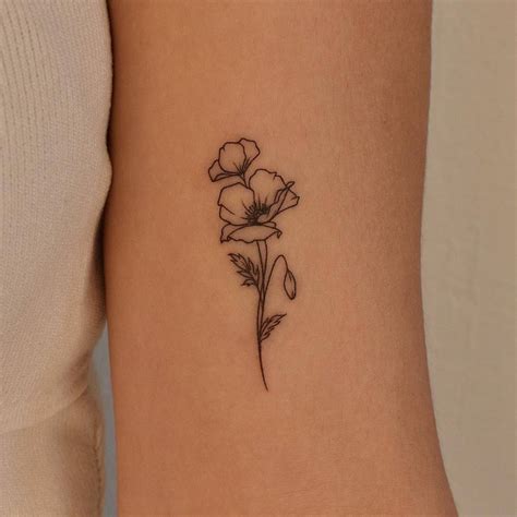 Poppy Flower Tattoo Located On The Bicep Fine Line