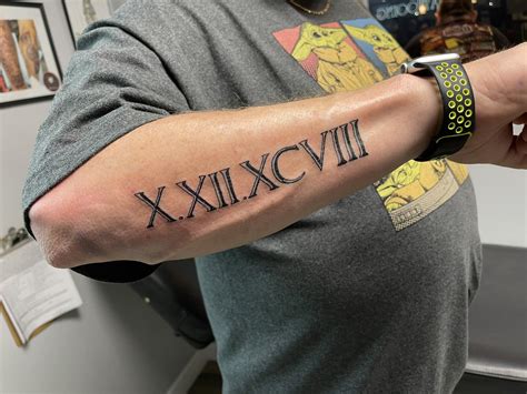 Roman Numeral Tattoo Men
