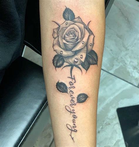 Rose Tattoo Designs And Hand Rose Tattoo In The World Of Art Holistic Ink