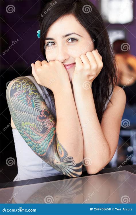 Showcasing Her Individual Style Portrait Of A Female Tattoo Artist Showcasing Her Individual Style Portrait Of A Female Tattoo Artist