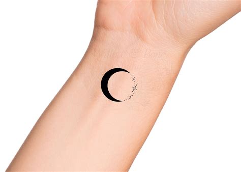 Simple Crescent Moon Finger Tattoo