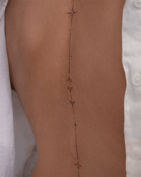 Subtle And Elegant Spine Tattoos For Women Subtle And Elegant Spine Tattoos For Women