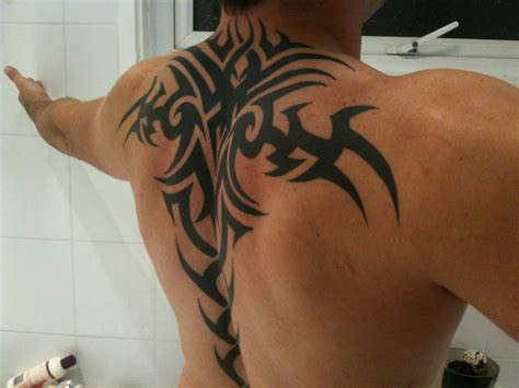 Top 10 Sexiest Tribal Back Tattoos For Men Mr Rauraur Top 10 Sexiest Tribal Back Tattoos For Men Mr Rauraur