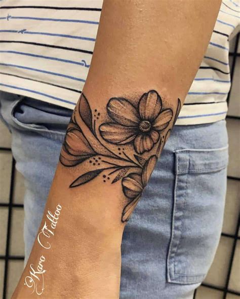 Top 37 Best Flower Wrist Tattoo Ideas 2021 Inspiration Guide Top 37 Best Flower Wrist Tattoo Ideas 2021 Inspiration Guide