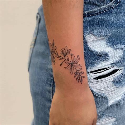 Wrist Female Tattoo Designs